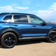 A photo of the Honda CR-V Hybrid in profile.